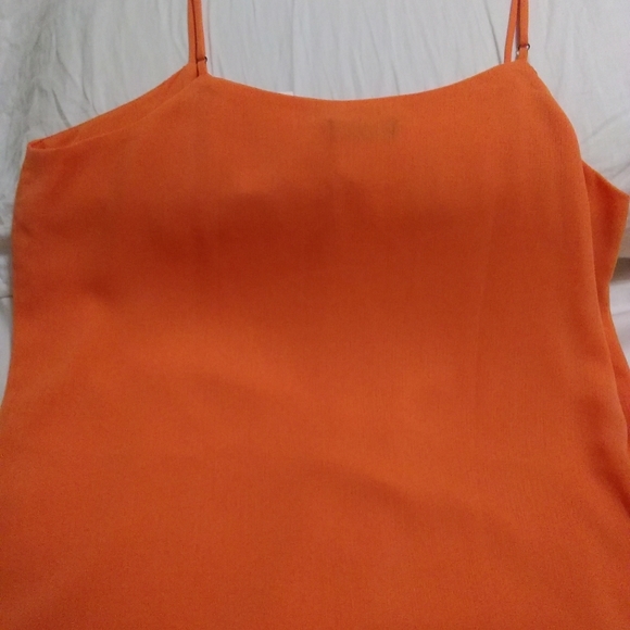 Tops - NWT orange sleeveless top by Jones & Company.